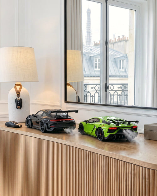 Les deux diffuseurs supercar Brume Motors sur un buffet dans un appartement parisien